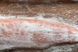 Salmon curing with salt